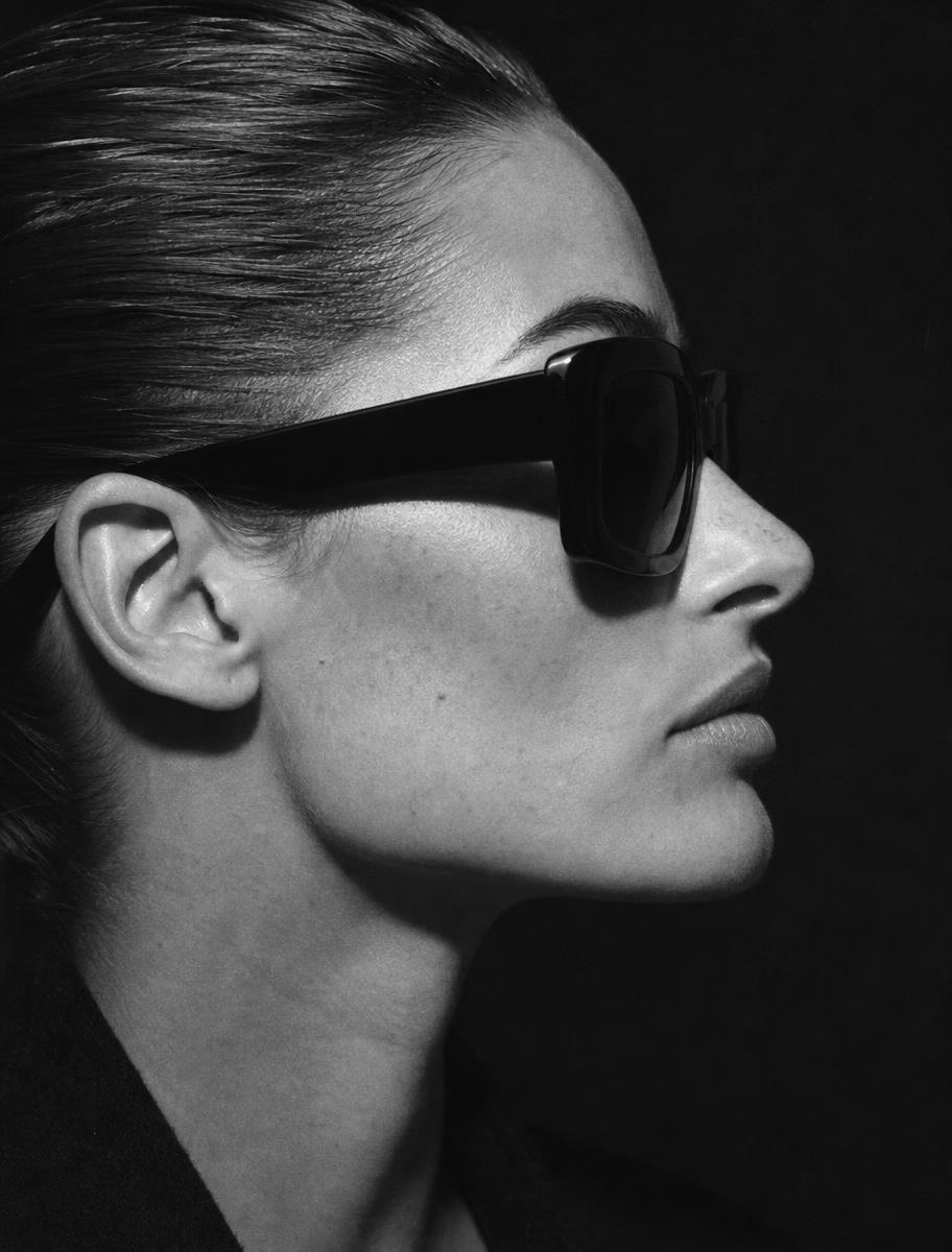 Monochrome profile portrait with oversized square INAX sunglasses
